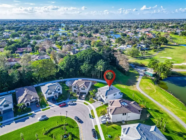 a view of a house with a yard pool outdoor seating and yard