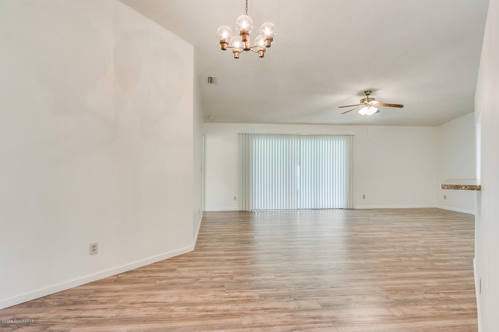 215 Rheine Road Northwest Palm Bay, FL 32907 - Photo 3 of 20 Great Room w/ Dining Area