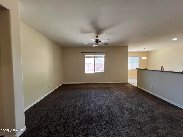 a view of an empty room and window