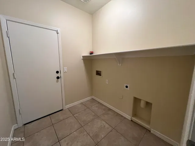 a view of a refrigerator in kitchen
