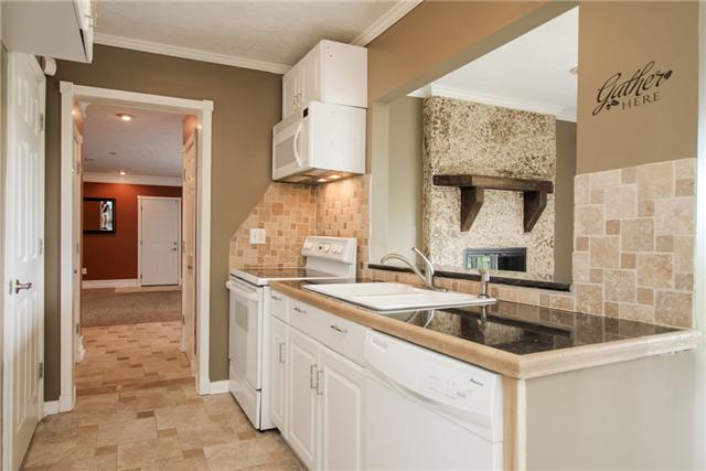 708 Pebble Point Road Lebanon, TN 37087 - Photo 4 of 20 a kitchen with a sink and cabinets