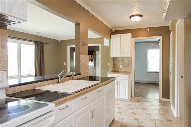 708 Pebble Point Road Lebanon, TN 37087 - Photo 5 of 20 a bathroom with a sink and a mirror