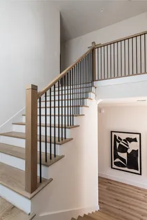 a living room with furniture and windows