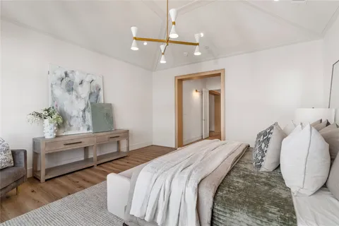 a view of a kitchen with granite countertop a fireplace and a window