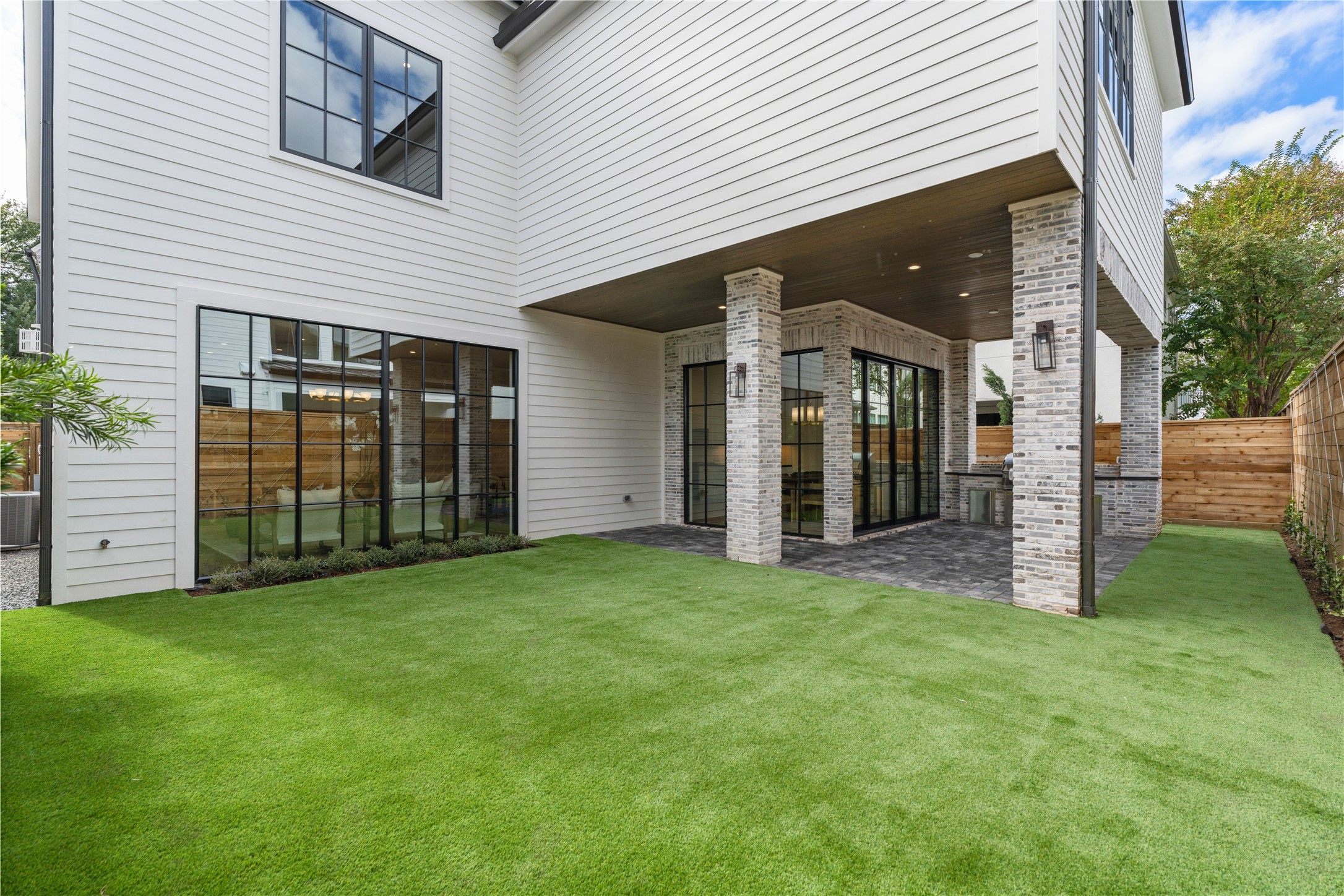 1204 Willard Street Houston, TX 77006 - Photo 5 of 6 The back yard and pavilion are home to so many possibilities: outdoor dining, cocktail pool, garden… the choice is yours! Artificial turf and low-maintenance landscaping mean maximum enjoyment with minimal effort. Fully fenced with drainage to the street.