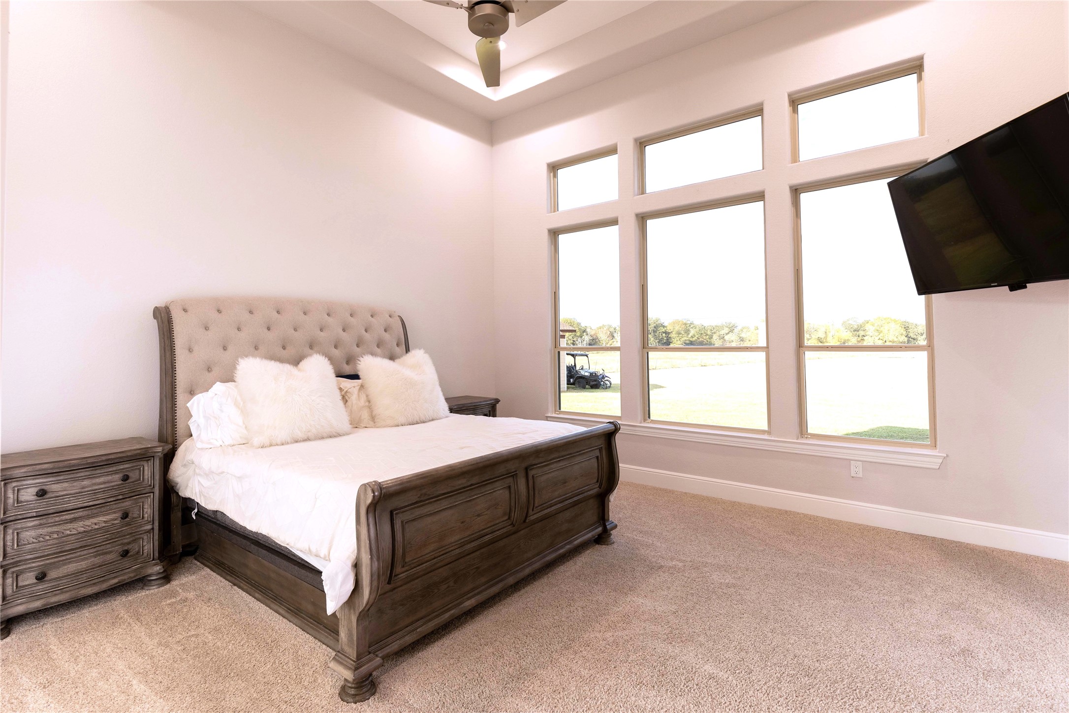 24445 Farm To Market 1887 Hempstead, TX 77445 - Photo 16 of 36 a spacious bedroom with a bed and a large window