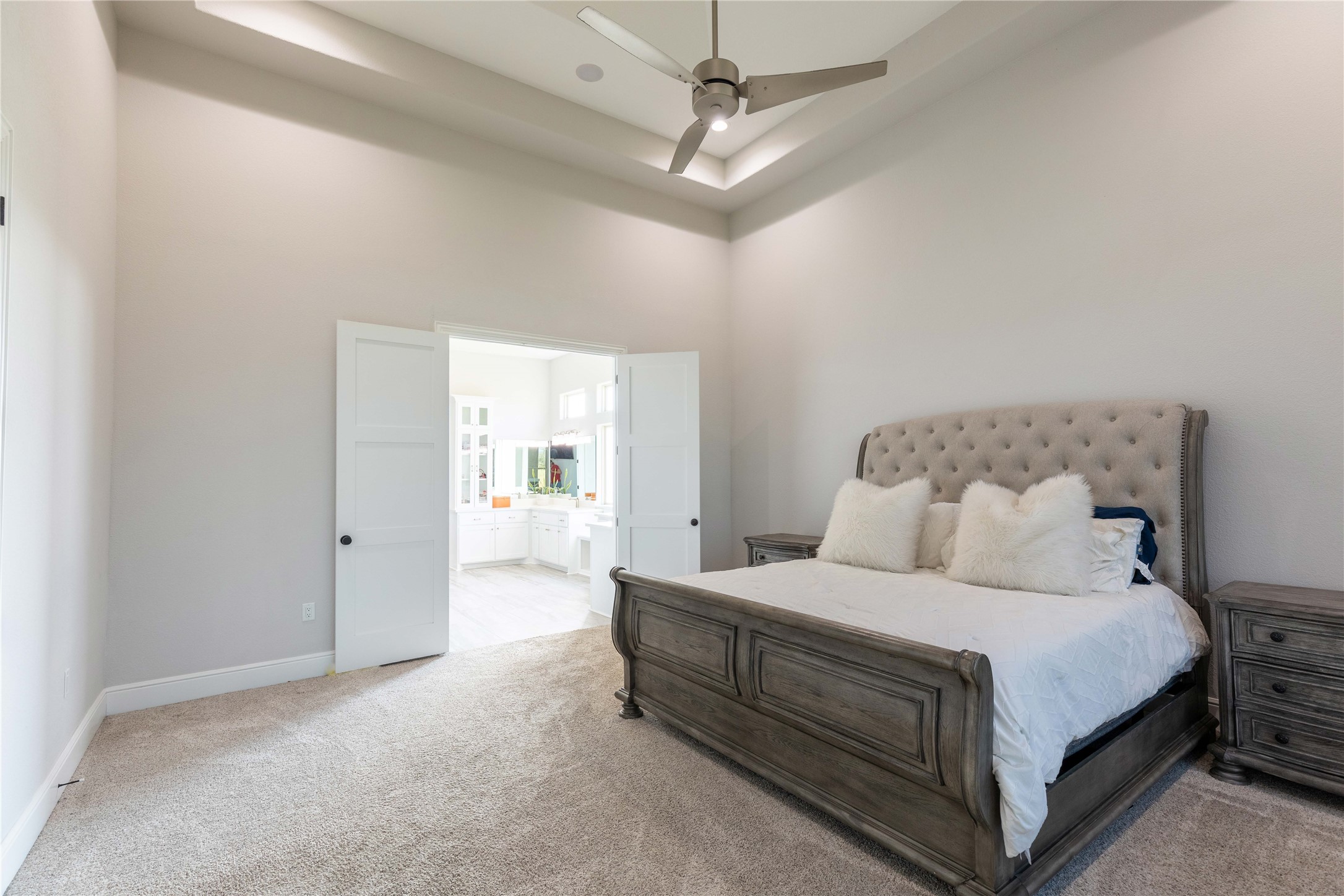 24445 Farm To Market 1887 Hempstead, TX 77445 - Photo 17 of 36 a bedroom with a bed and a chandelier