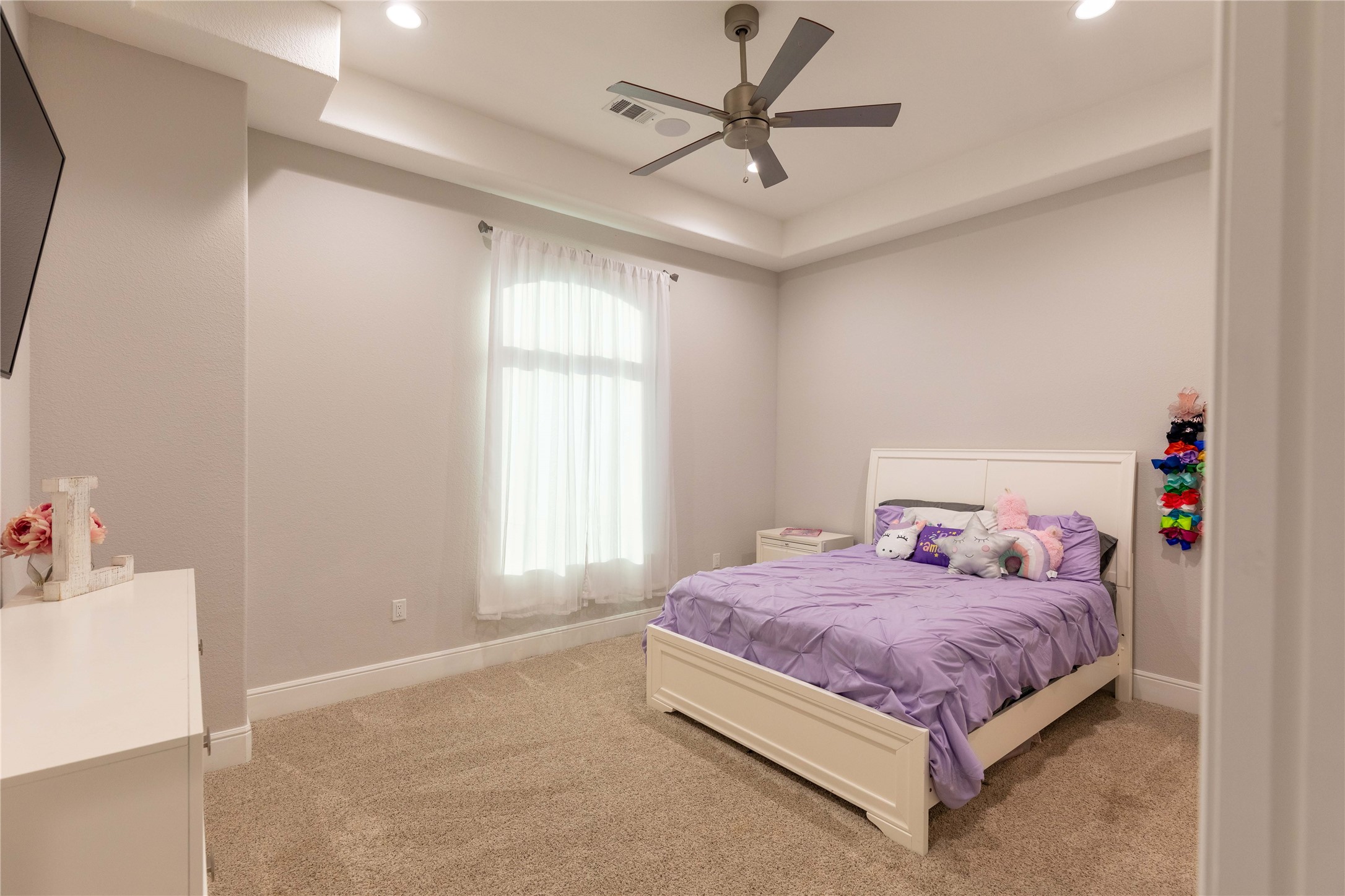 24445 Farm To Market 1887 Hempstead, TX 77445 - Photo 27 of 36 a bedroom with a bed chandelier and a window
