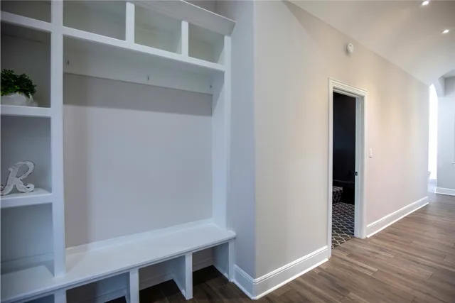 a view of entryway with wooden floor