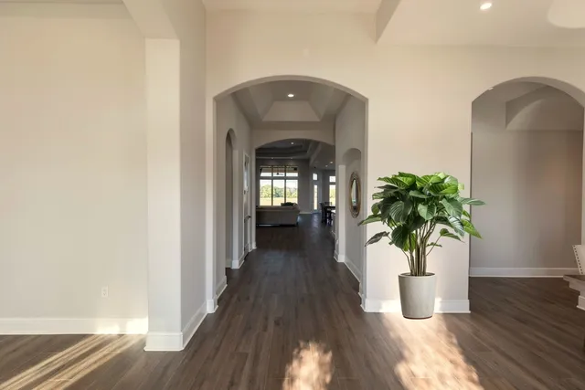 a view of entryway with wooden floor