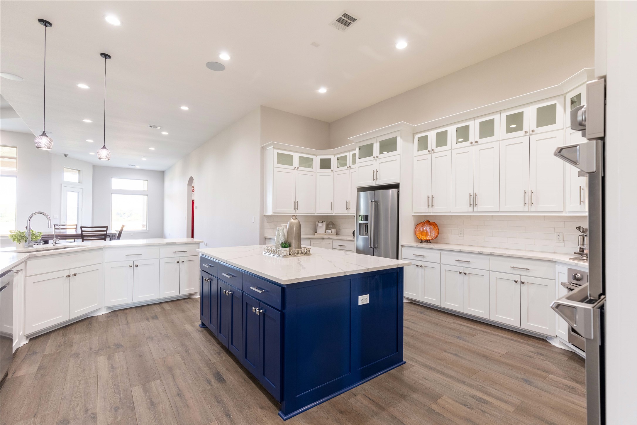 24445 Farm To Market 1887 Hempstead, TX 77445 - Photo 10 of 36 a large kitchen with a lot of counter space and wooden floor