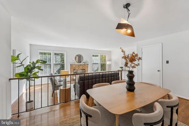 a kitchen with stainless steel appliances granite countertop a refrigerator sink and microwave