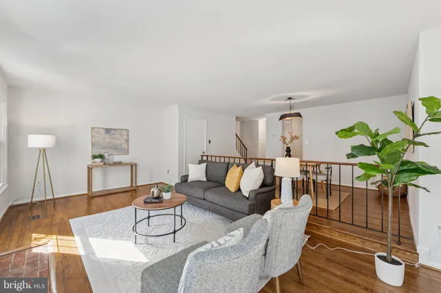a kitchen with granite countertop wooden cabinets and stainless steel appliances