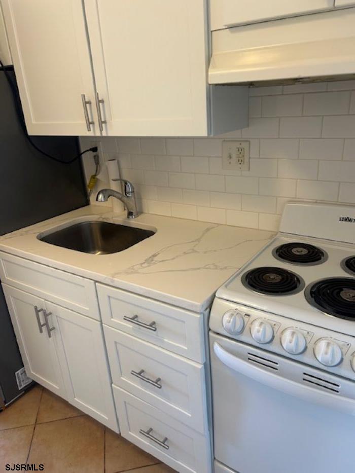 101 South Raleigh Avenue, Unit 521 Atlantic City, NJ 08401 - Photo 7 of 19 a close view of washer and dryer