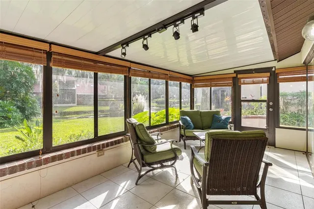 a view of a house with backyard and garden