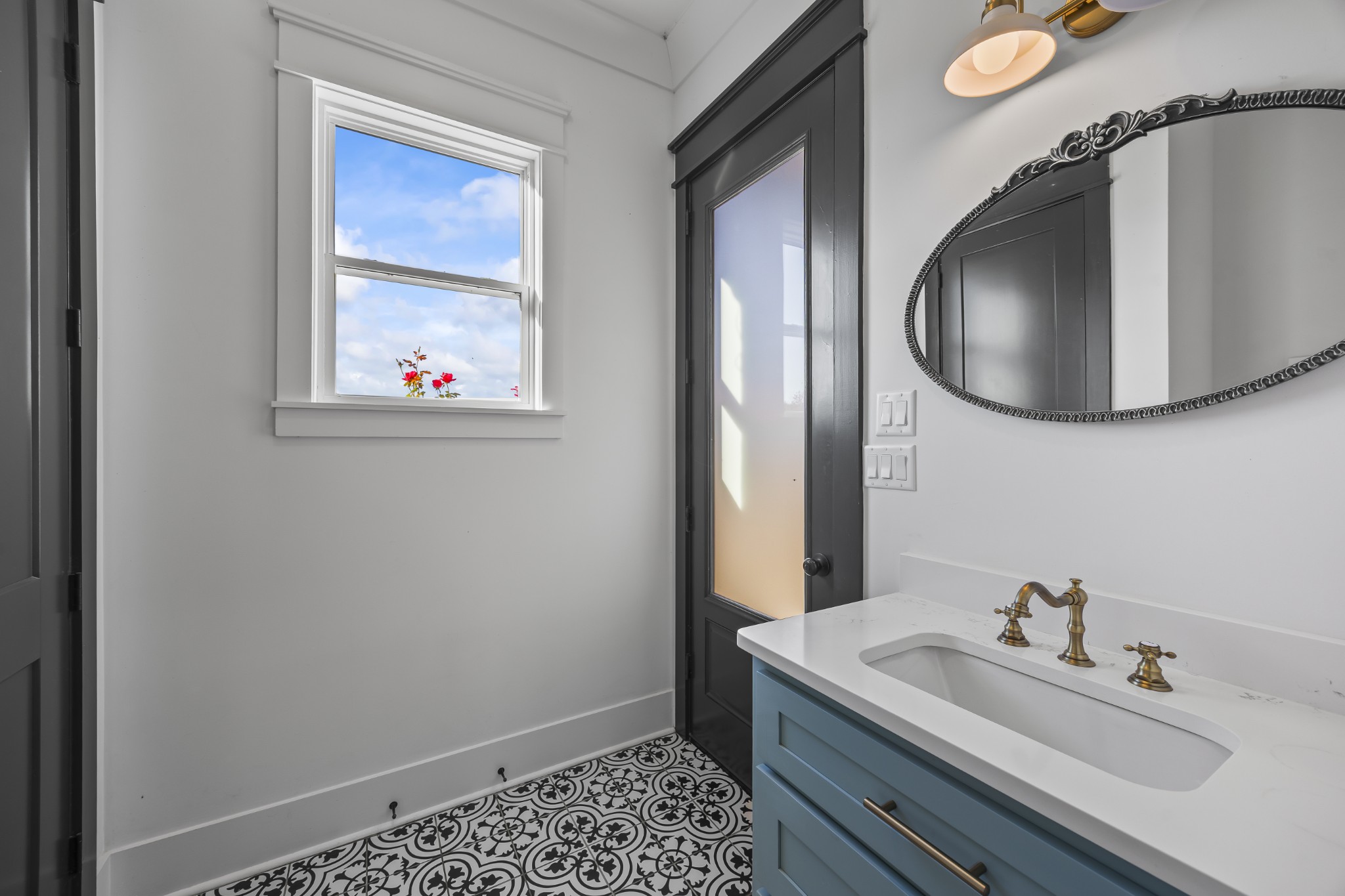 168 Huntersville Denmark Road Denmark, TN 38391 - Photo 21 of 41 a bathroom with a sink a vanity and a mirror