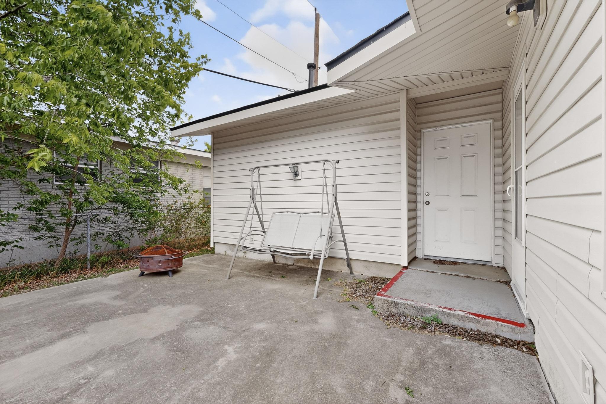 6808 Daugherty Street Austin, TX 78757 - Photo 17 of 20 a view of a car garage door