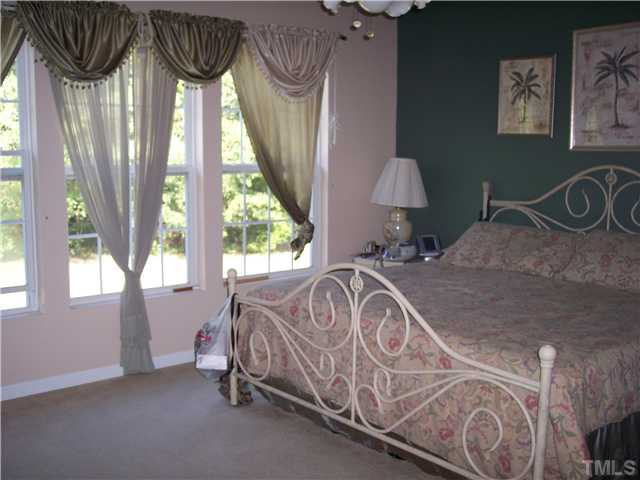 4736 Cardinal Grove Boulevard Raleigh, NC 27616 - Photo 20 of 25 Master Bedroom