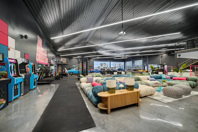 a living room with lots of furniture and clutter