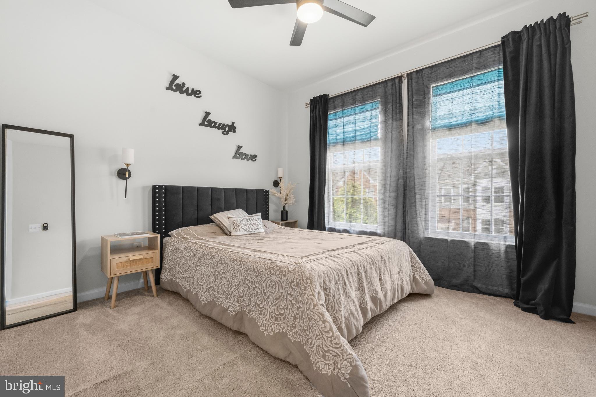 7715 Cresap Lane Hanover, MD 21076 - Photo 27 of 42 a bedroom with a bed and a window