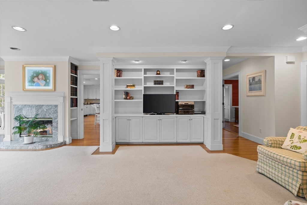 29 Woodcliff Road Wellesley, MA 02481 - Photo 11 of 31 a living room with furniture and a fireplace