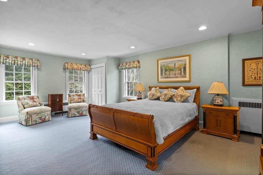 29 Woodcliff Road Wellesley, MA 02481 - Photo 14 of 31 a spacious bedroom with a bed and furniture