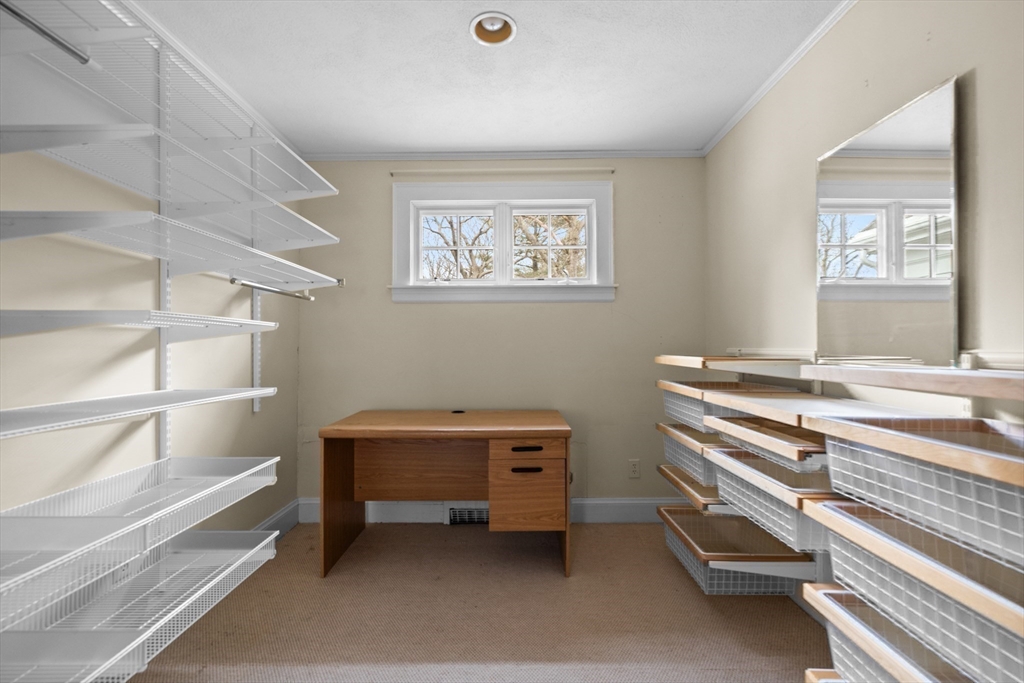 29 Woodcliff Road Wellesley, MA 02481 - Photo 19 of 31 a room with a bed and a window