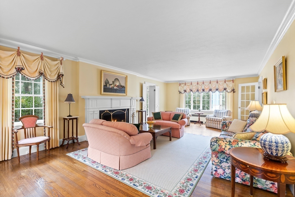 29 Woodcliff Road Wellesley, MA 02481 - Photo 4 of 31 a living room with fireplace furniture and a wooden floor