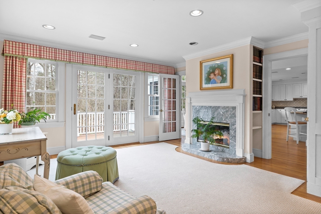 29 Woodcliff Road Wellesley, MA 02481 - Photo 10 of 31 a living room with furniture and a fireplace