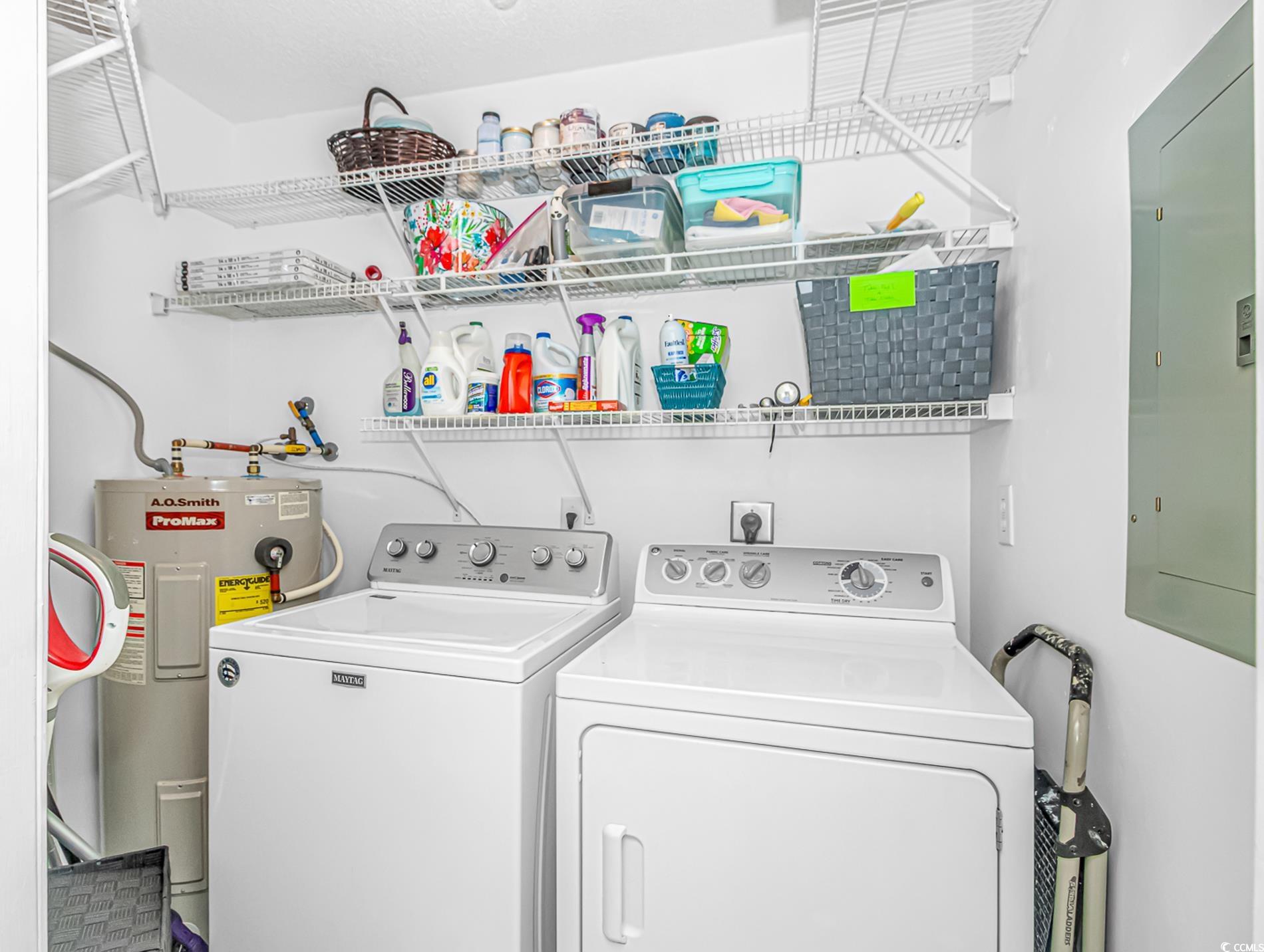 4394 Daphne Lane, Unit G Murrells Inlet, SC 29576 - Photo 18 of 30 Laundry room featuring water heater, electric panel, and washing machine and clothes dryer