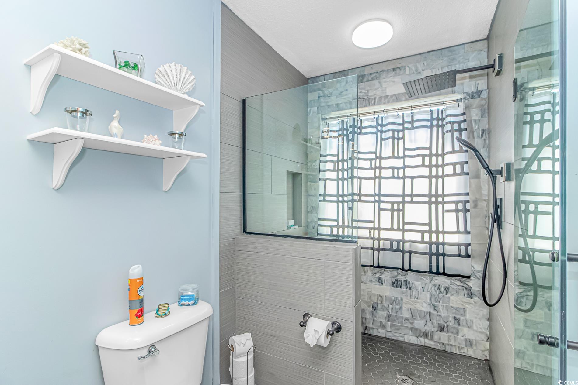 4394 Daphne Lane, Unit G Murrells Inlet, SC 29576 - Photo 28 of 30 Bathroom with toilet and walk in shower