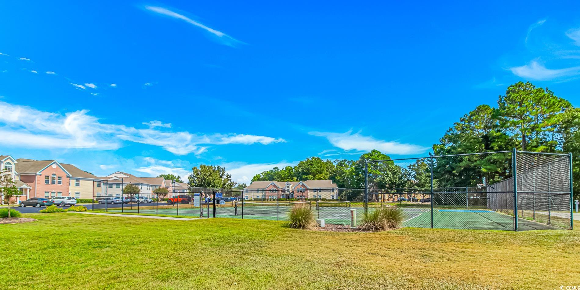 4394 Daphne Lane, Unit G Murrells Inlet, SC 29576 - Photo 4 of 30 View of tennis court with a residential view