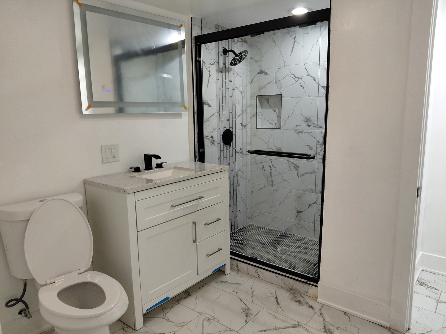 6441 South Campbell Avenue Chicago, IL 60629 - Photo 20 of 24 a bathroom with a toilet sink and shower