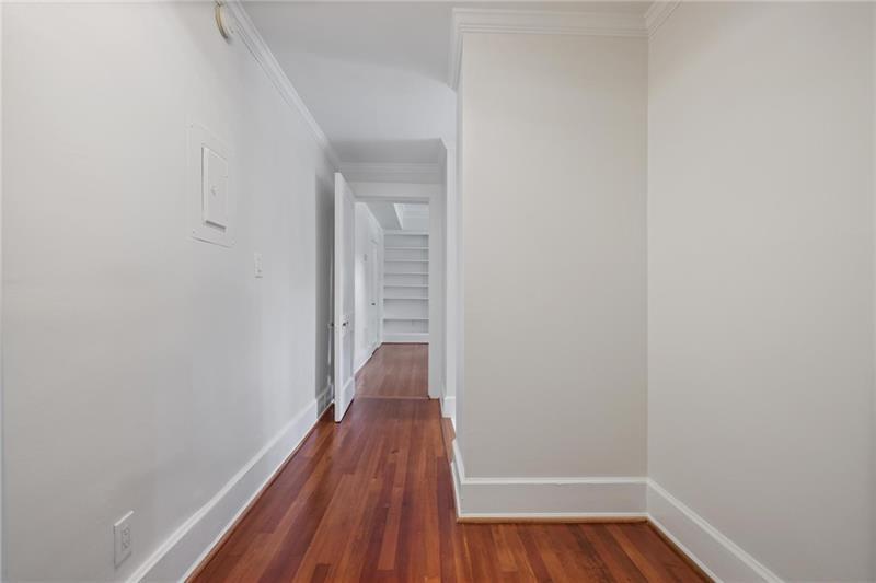1 South Prado Northeast, Unit 1 Atlanta, GA 30309 - Photo 14 of 21 a view of a hallway with wooden floor