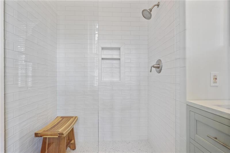 1 South Prado Northeast, Unit 1 Atlanta, GA 30309 - Photo 17 of 21 a bathroom with a shower curtain