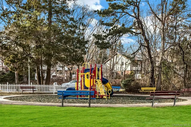 a view of a house with a yard porch and sitting area