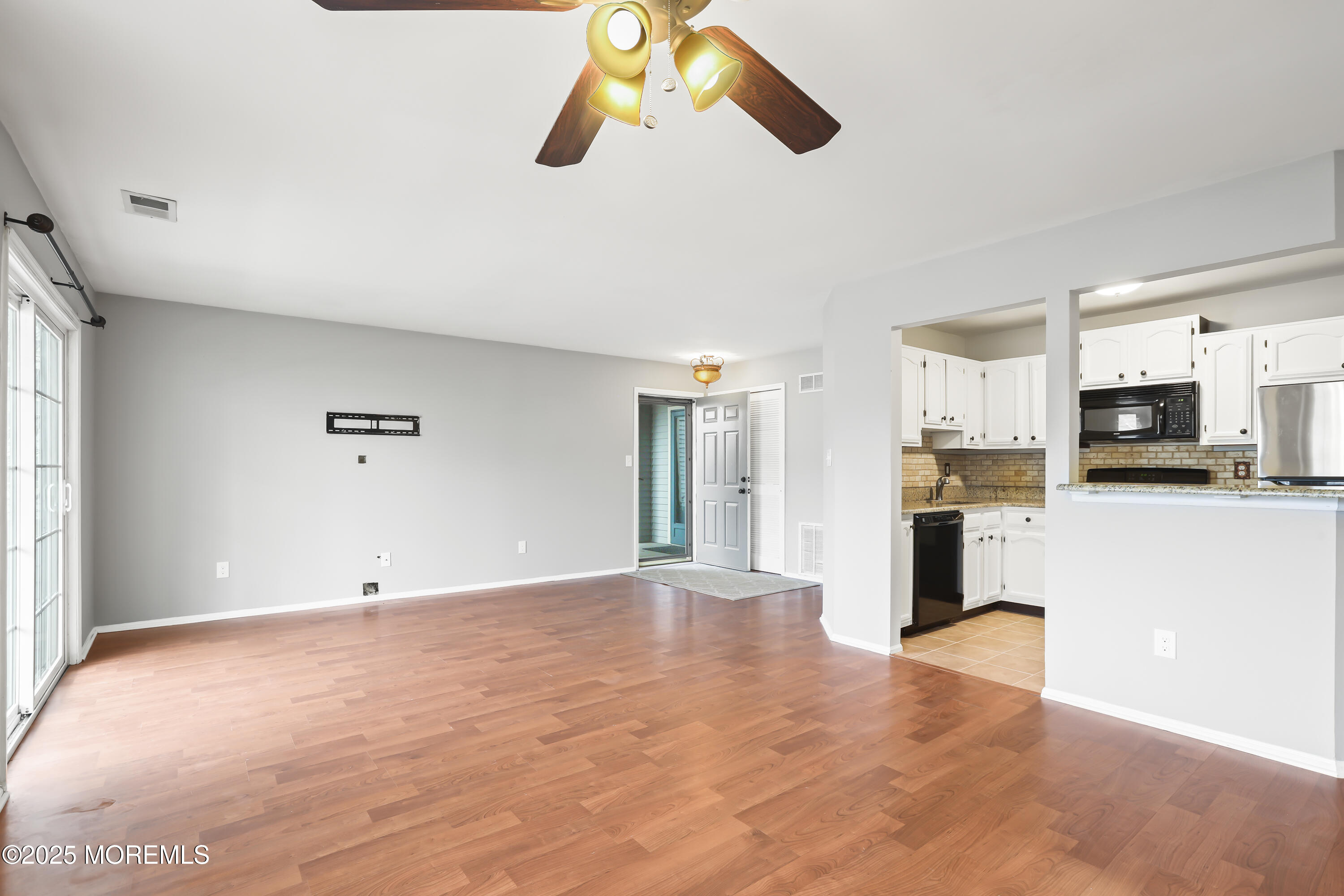 461 Magnolia Court Howell, NJ 07731 - Photo 7 of 26 a view of a kitchen with furniture and a kitchen