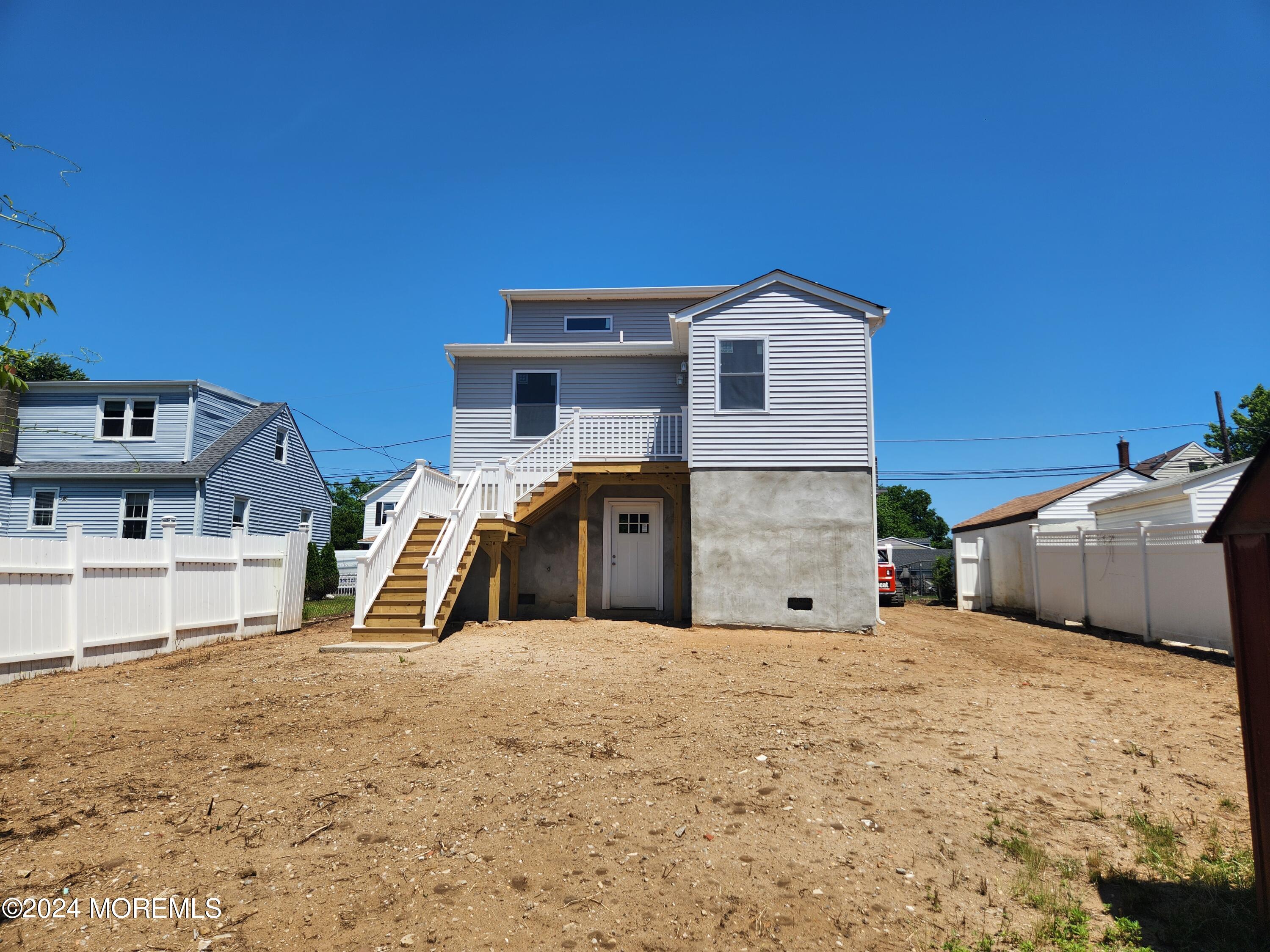 124 Victoria Place Union Beach, NJ 07735 - Photo 27 of 29 a view of a house with a large space in front of it