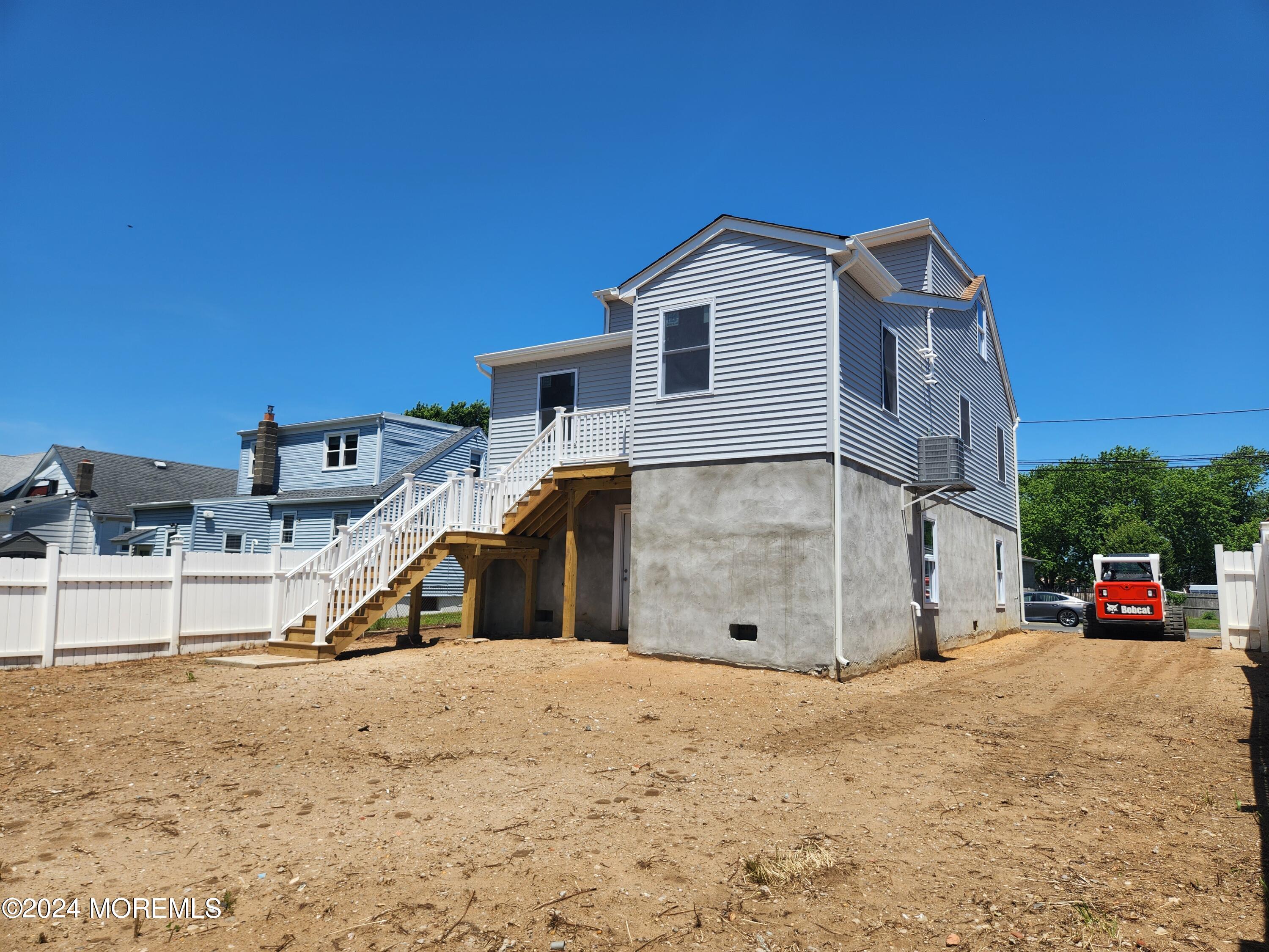 124 Victoria Place Union Beach, NJ 07735 - Photo 29 of 29 a view of a house with snow on the road