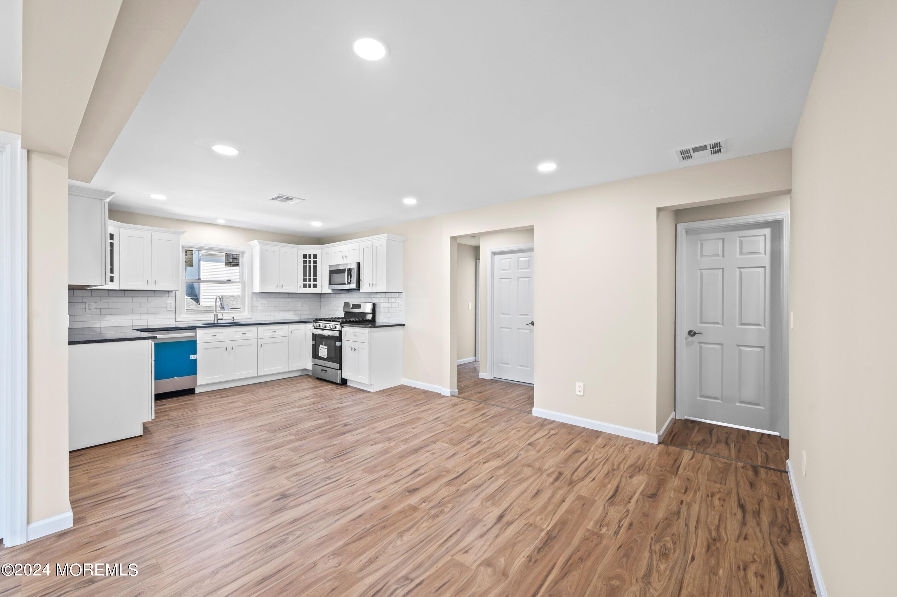 124 Victoria Place Union Beach, NJ 07735 - Photo 3 of 29 a view of kitchen with wooden floor