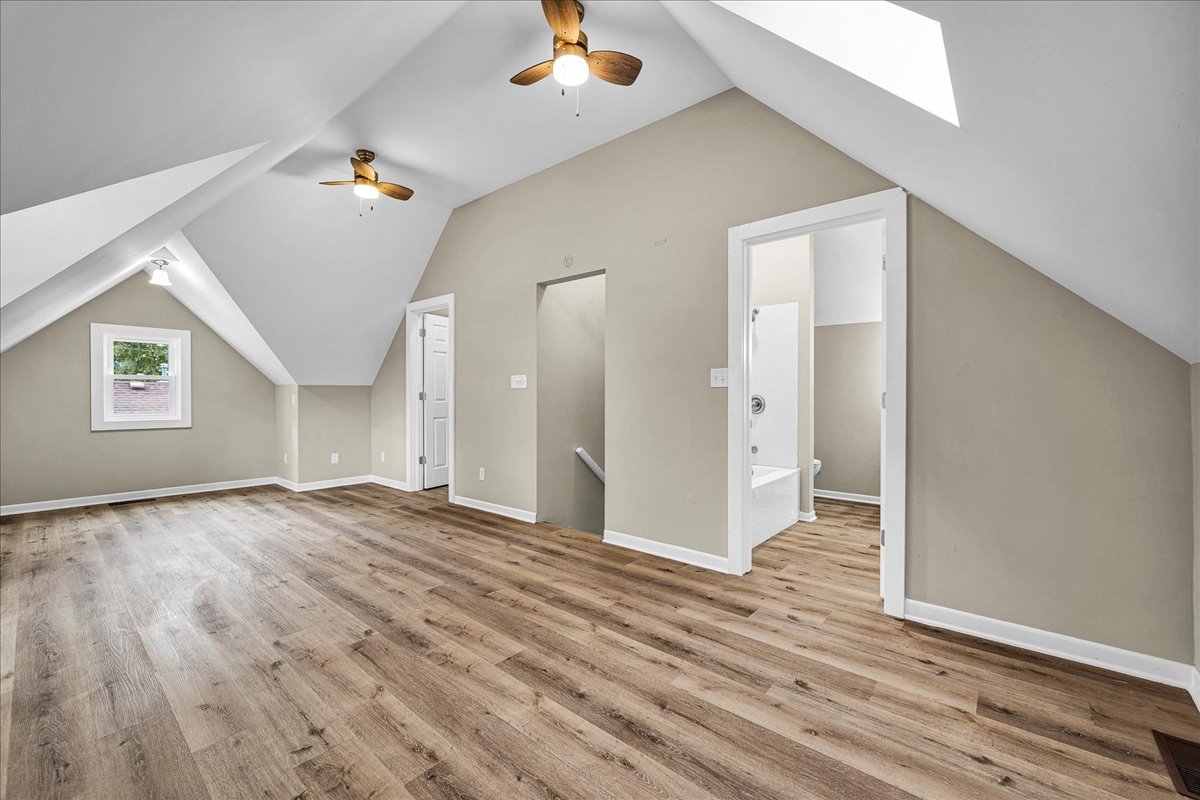 222 West Chestnut Street Hoopeston, IL 60942 - Photo 20 of 28 a view of a livingroom with wooden floor and a ceiling fan