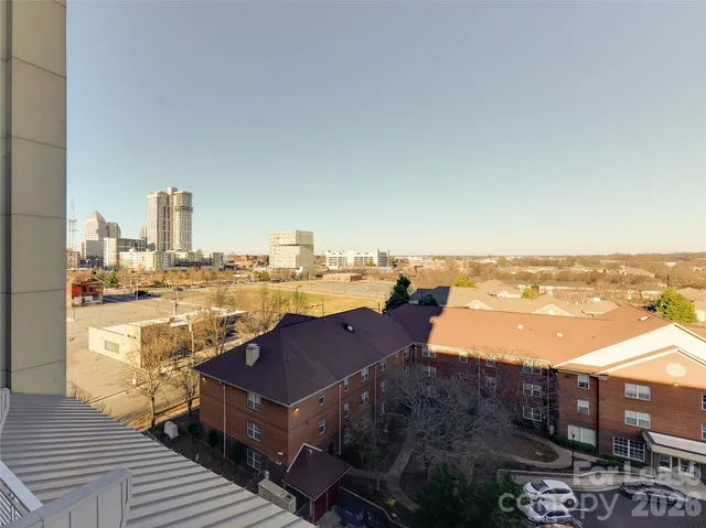 a view of a city with an ocean view