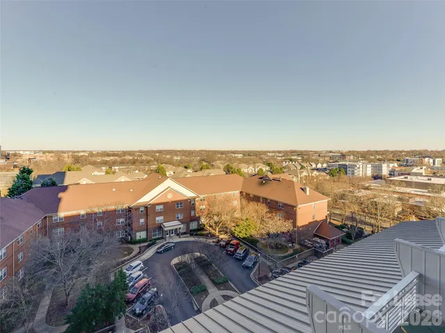 an aerial view of a house with a ocean view