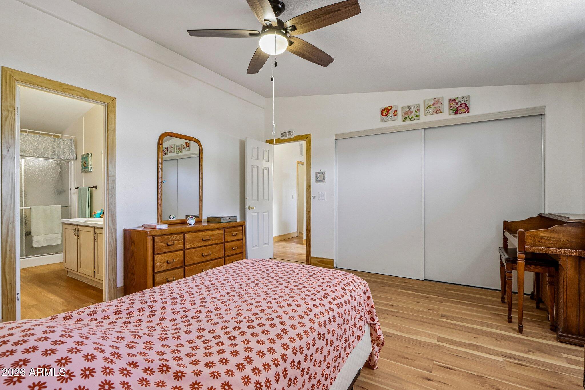 114 South Pinecrest Road Payson, AZ 85541 - Photo 23 of 40 a bedroom with a bed and a dresser