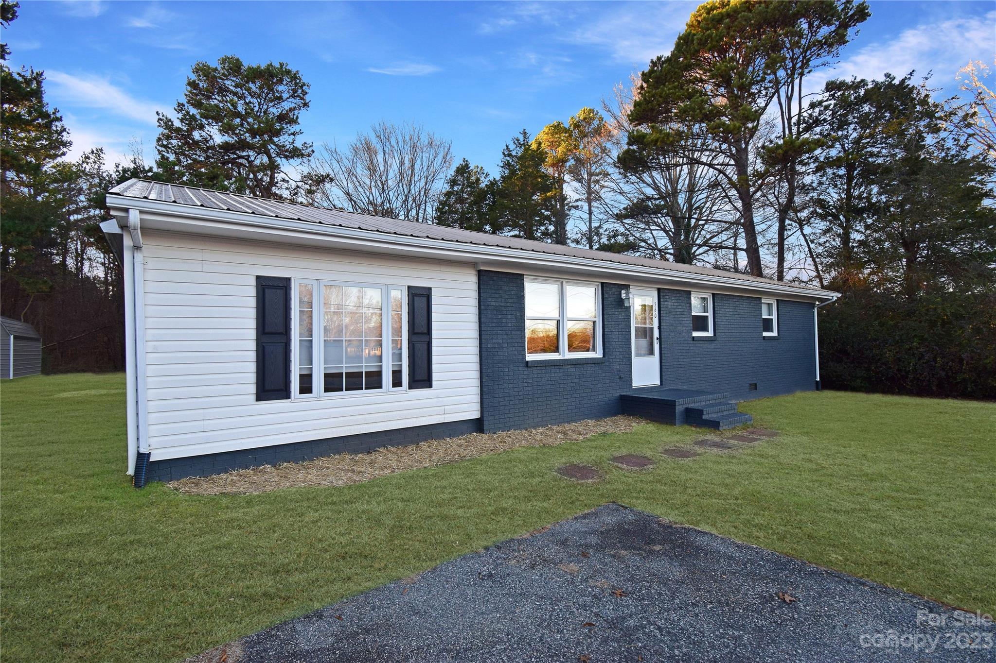 560 Junction Road Mocksville, NC 27028 - Photo 1 of 27 a view of front of a house with a yard