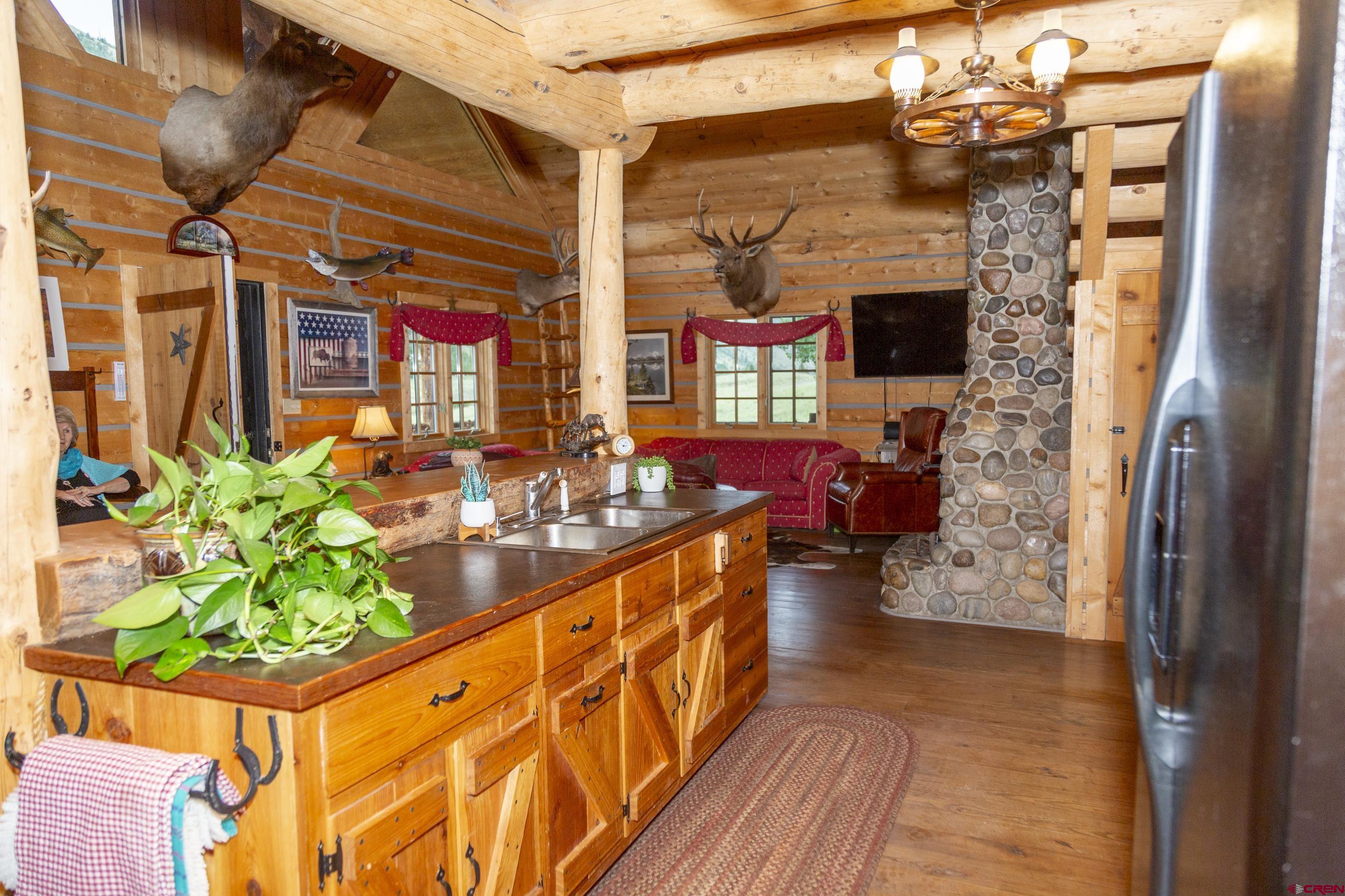 2150 Usfs 521 Road, Unit 18A Creede, CO 81130 - Photo 15 of 31 a lobby with furniture and garden