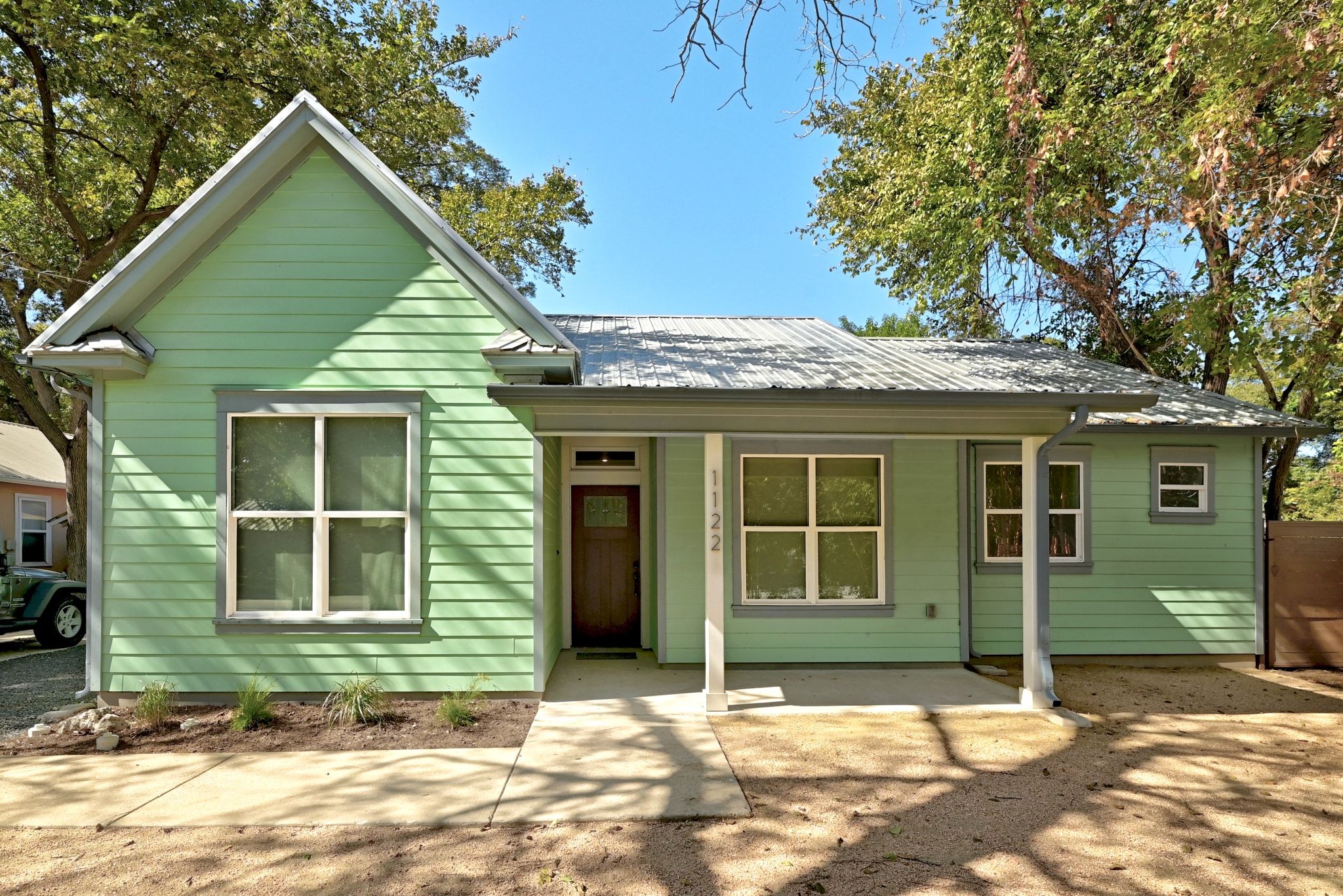 1122 Tillery Street Austin, TX 78702 - Photo 1 of 1 View of front of house with a metal roof