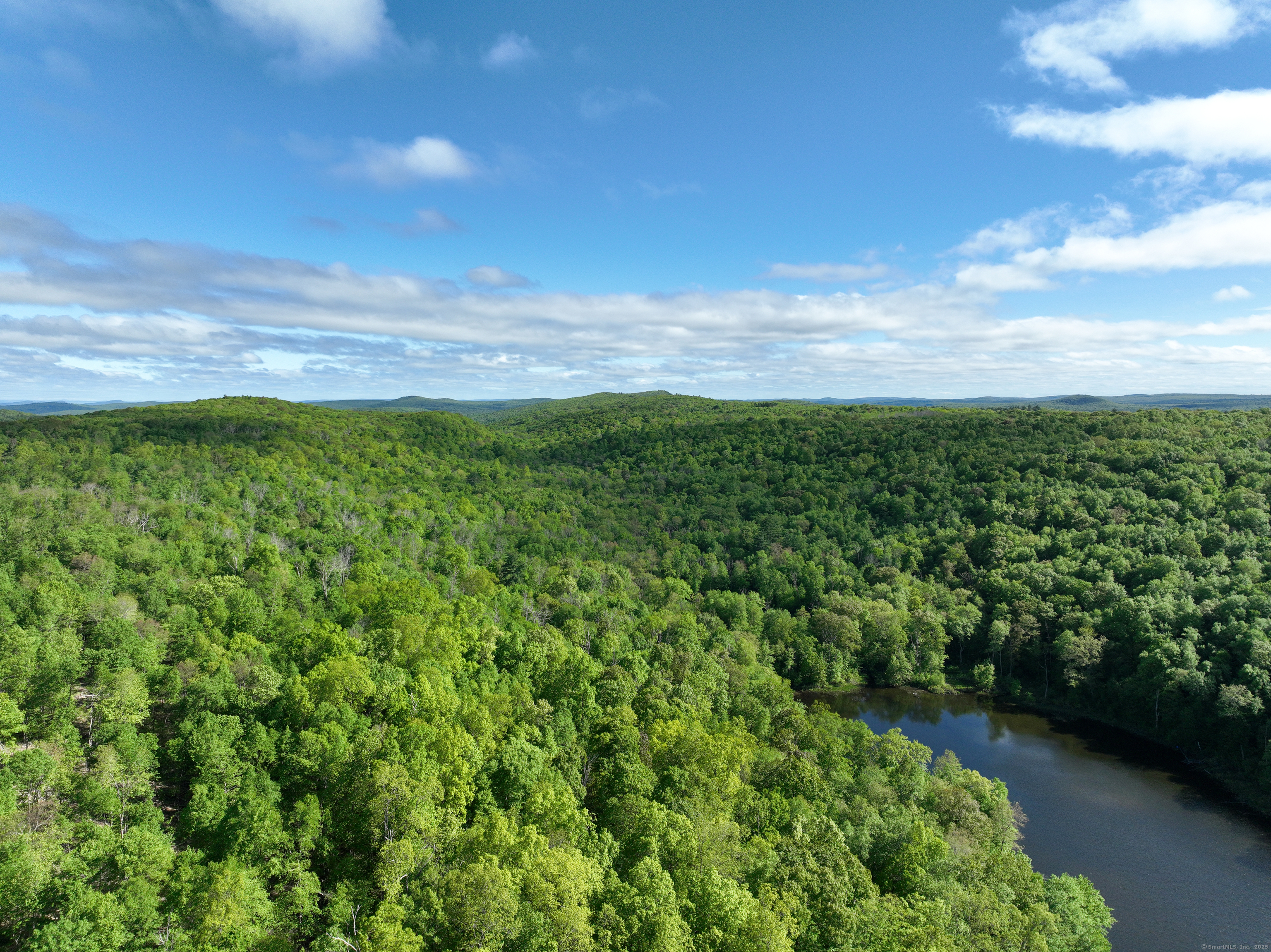 201 Diamond Ledge Road Stafford, CT 06076 - Photo 25 of 25 a view of a garden with an outdoor space