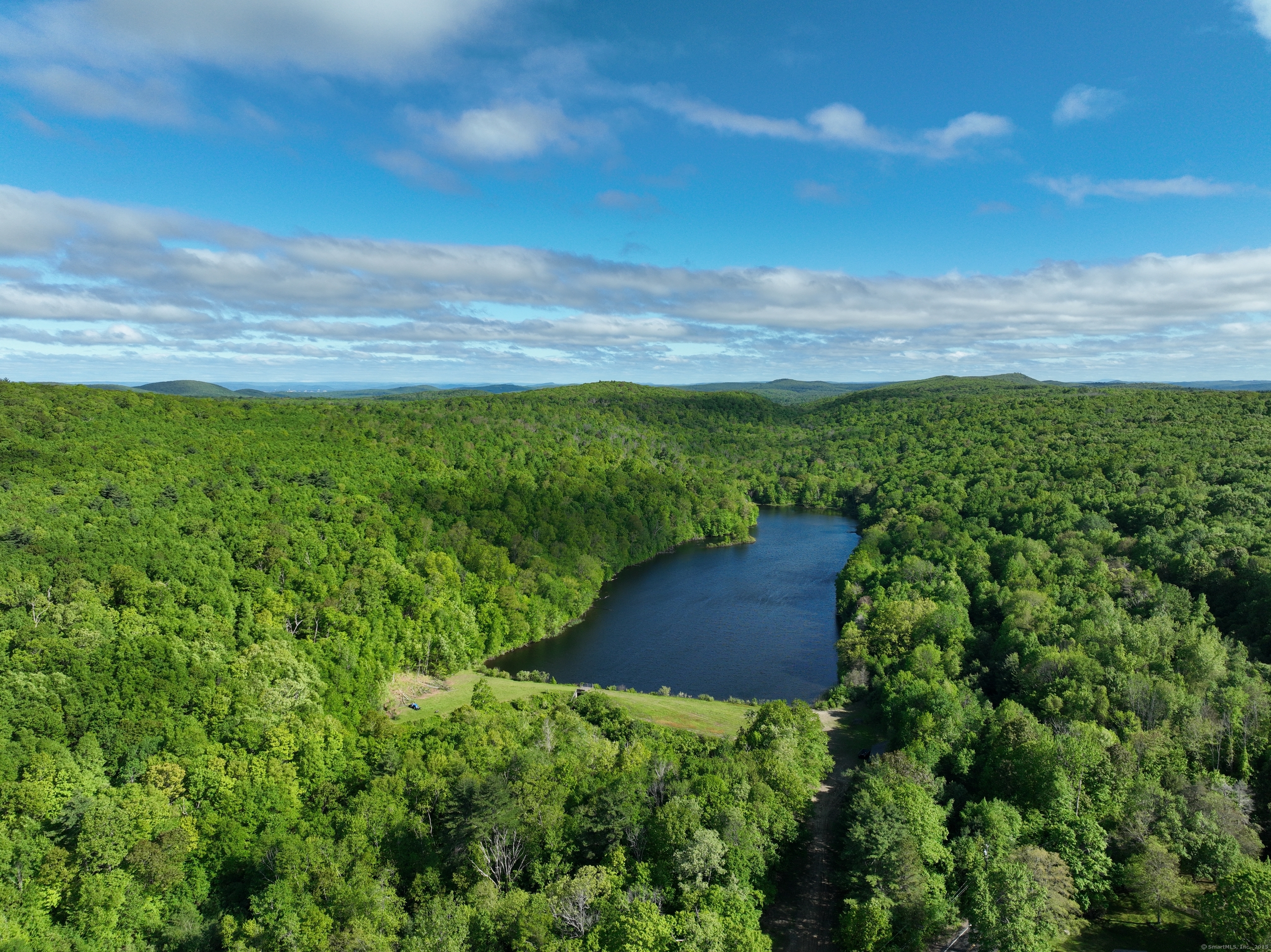 201 Diamond Ledge Road Stafford, CT 06076 - Photo 4 of 25 a view of a garden with an outdoor space