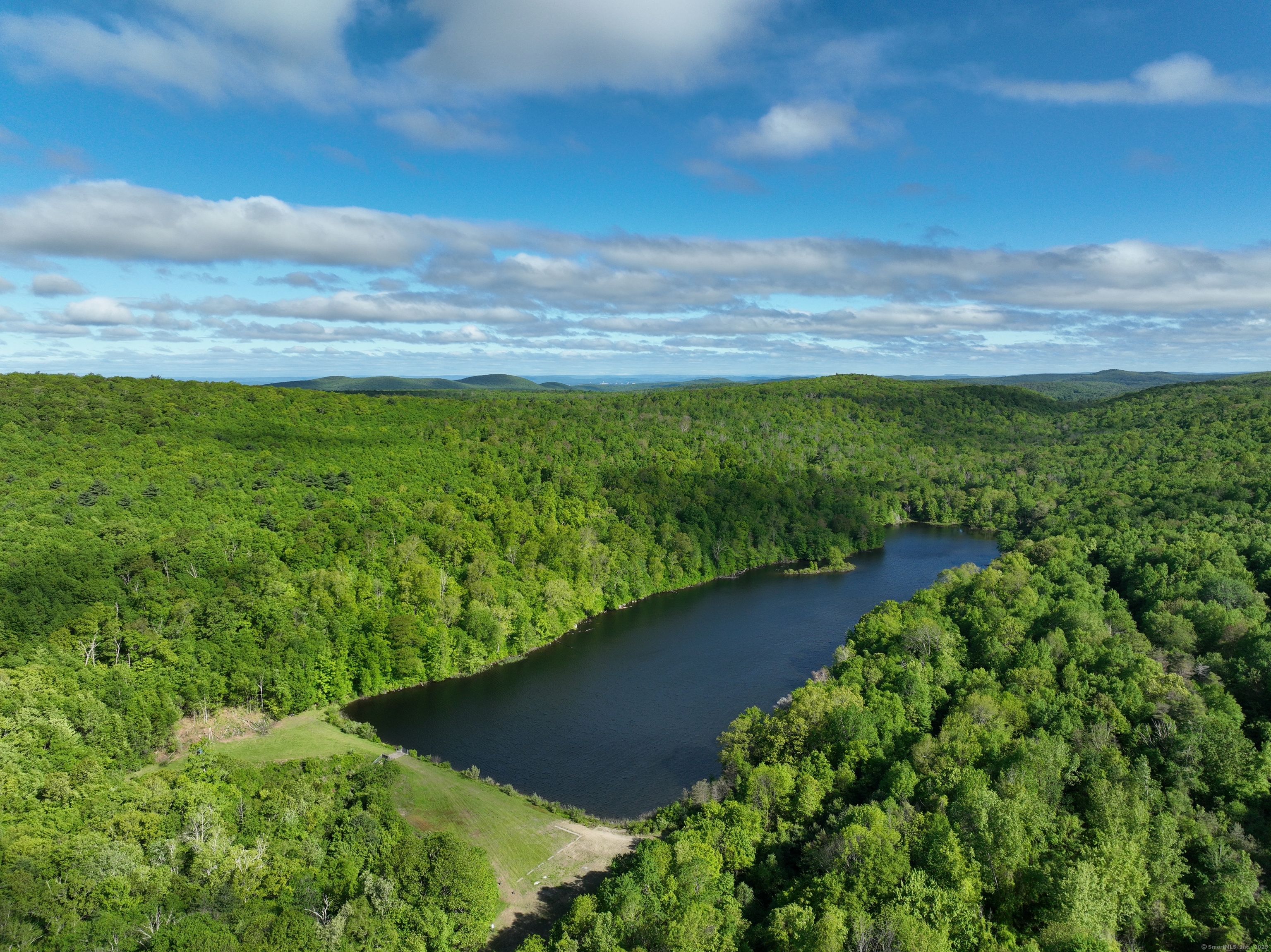 201 Diamond Ledge Road Stafford, CT 06076 - Photo 6 of 25 a view of a garden with an outdoor space